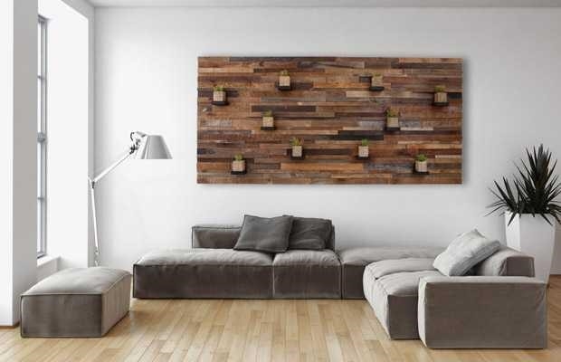 Việc sử dụng gỗ để ốp tường trong hình thức tranh nghệ thuật đang trở thành xu hướng phổ biến.