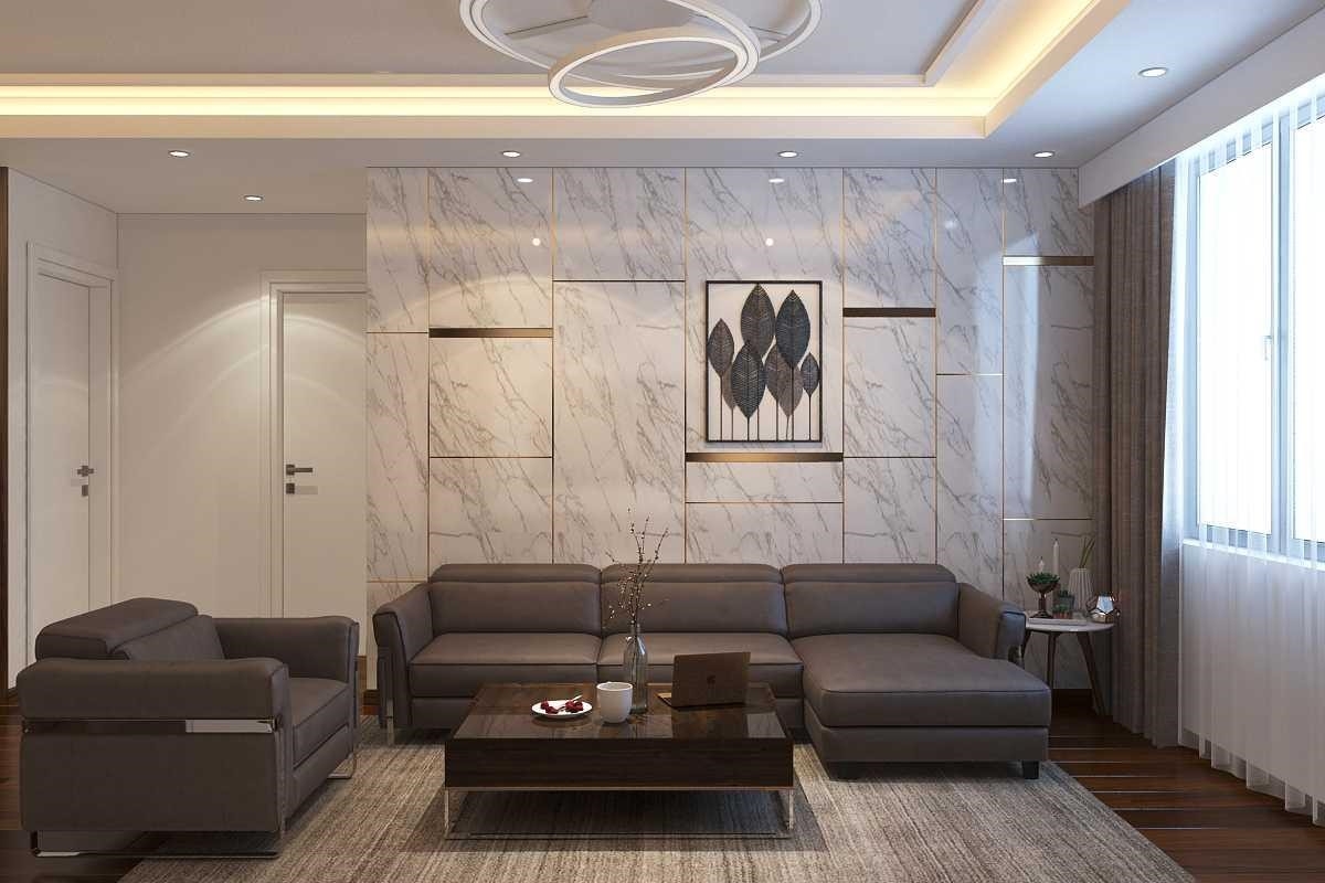 Phòng khách được trang trí bằng vách gỗ dán đá và điểm xuyết bằng bộ sofa.