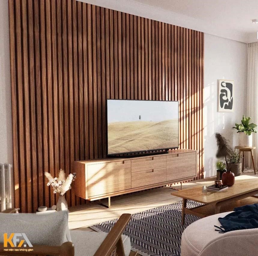 Sử dụng gỗ tự nhiên để thiết kế vách tivi mang đến vẻ đẹp sang trọng.